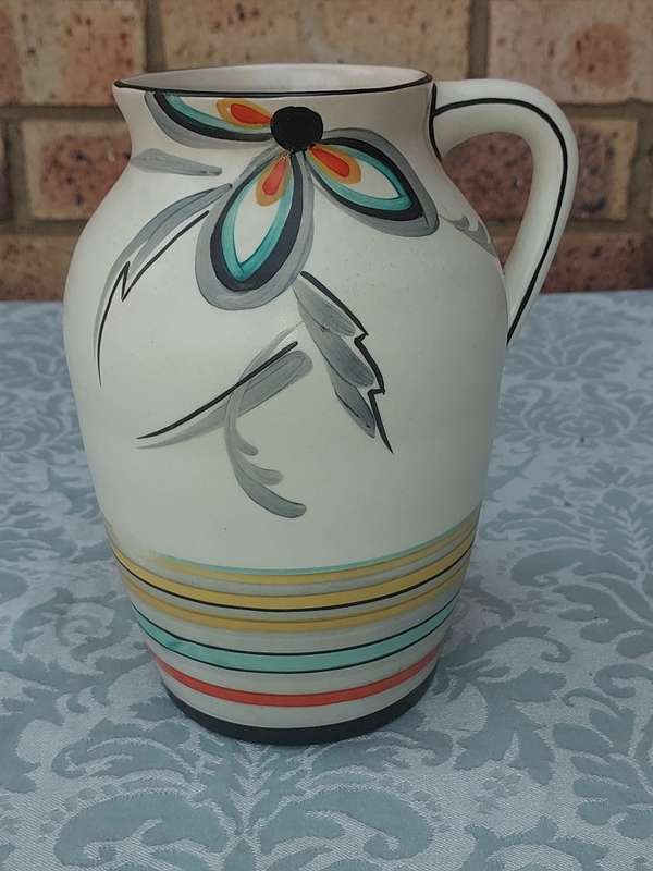 A VINTAGE WATER JUG BY BEVERLEY POTTERY MADE IN ENGLAND 213