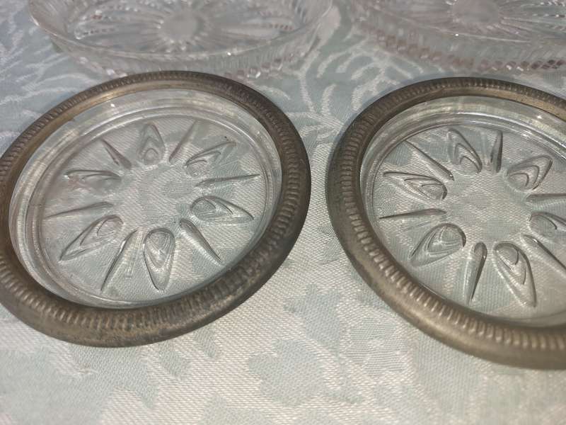A COLLECTION OF COASTER WITH SILVER PLATED RIMS AND ORNATE CONDIMENTS OVAL MINIATURE PLATTERS
