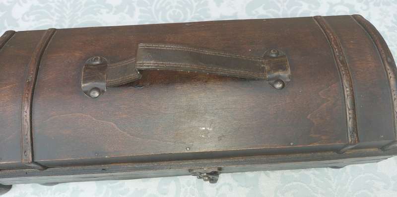 TWO ORNATE WOODEN WINE CADDYS WITH LEATHER HANDLES