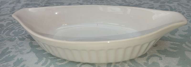 A COLLECTION OF 3 AU GRATIN DISHES SOLD AS IS