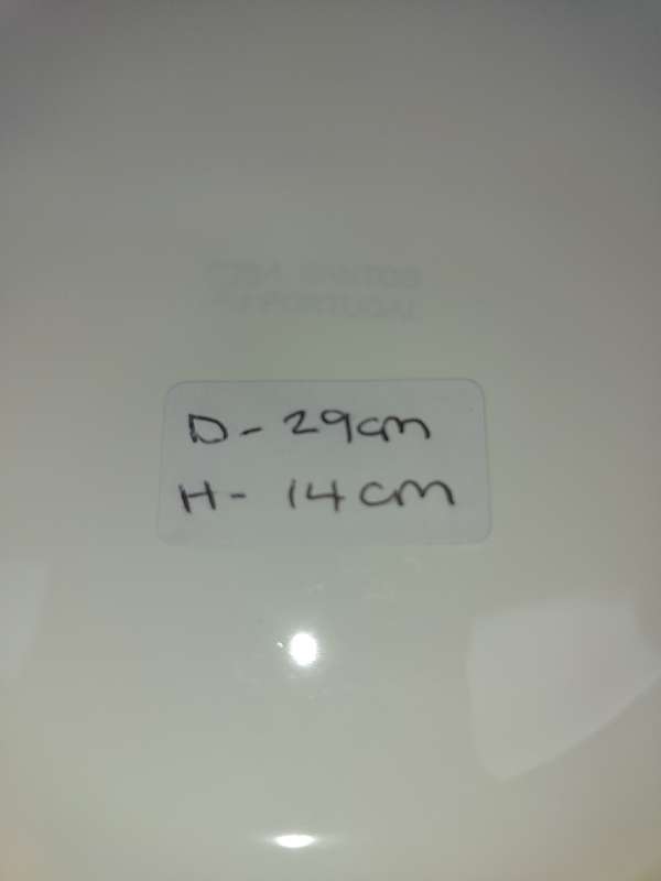 A ROUND WHITE PORCELAIN SERVING BOWL