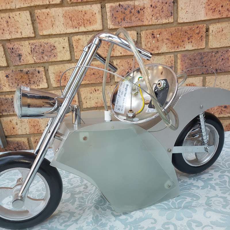 AN ART DECOR MOTOR CYCLE CHANDELIER
