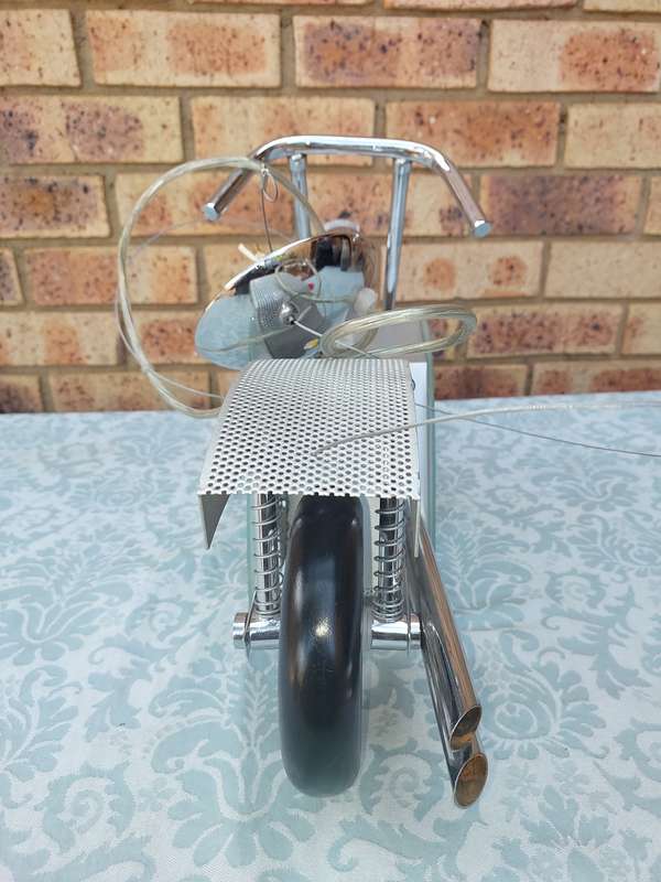 AN ART DECOR MOTOR CYCLE CHANDELIER