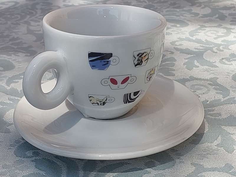 A COLLECTORS ILLY ART COLLECTION 25TH ANIVERSARY COFFEE CUP AND SAUCER