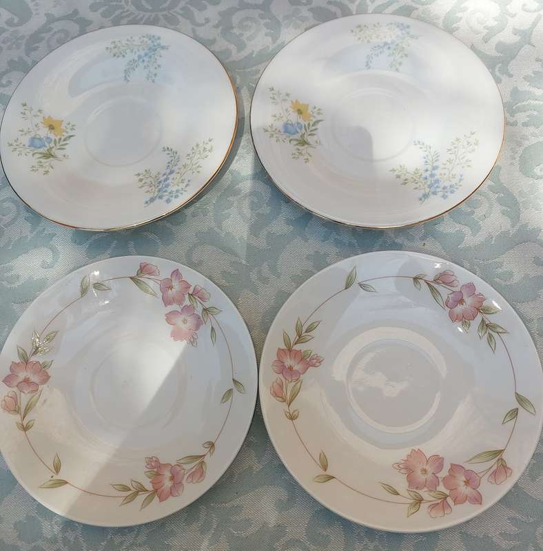 A COLLECTION OF 4 SAUCERS SOLD AS IS