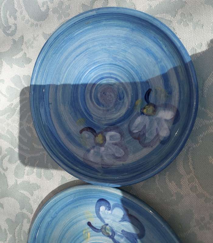 A  COLLECTION OF 4 BLUE CERAMIC DESERT PLATES
