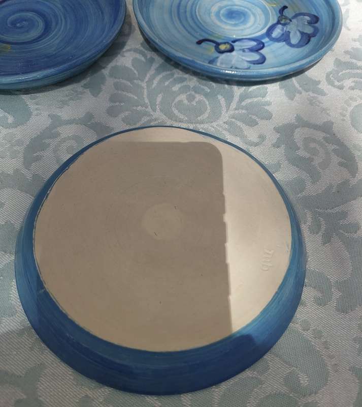 A  COLLECTION OF 4 BLUE CERAMIC DESERT PLATES
