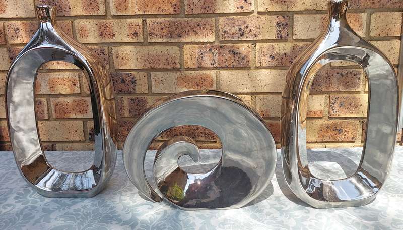 A COLLECTION OF 3 ART DECOR SILVERPLATE ON CERAMIC SCULPTURES
