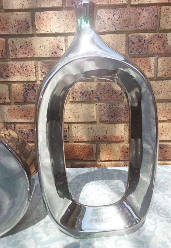 A COLLECTION OF 3 ART DECOR SILVERPLATE ON CERAMIC SCULPTURES
