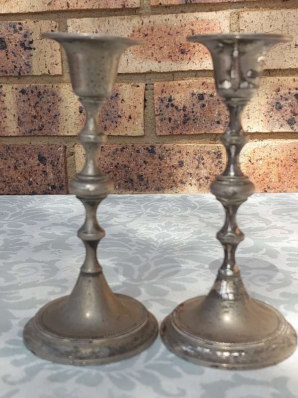 TWO VINTAGE CANDLE HOLDERS SOLD AS IS