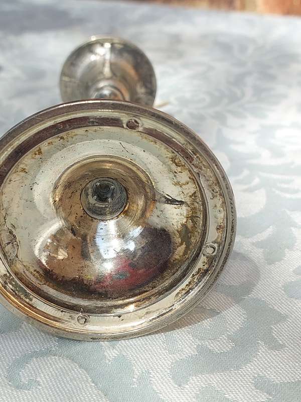 TWO VINTAGE CANDLE HOLDERS SOLD AS IS
