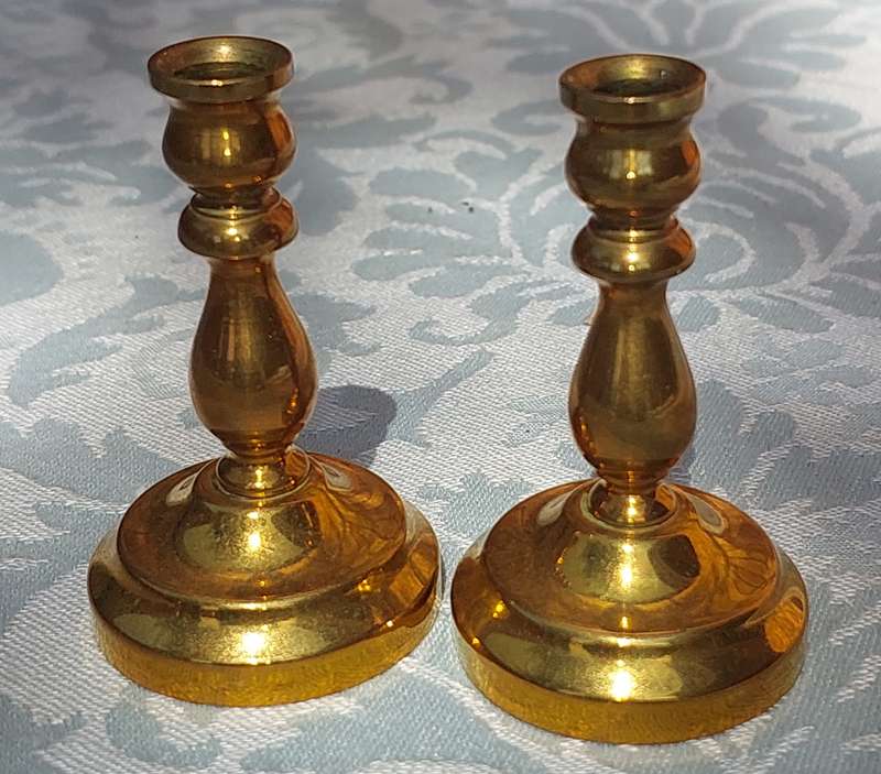 TWO MINIATURE BRASS CANDLE HOLDERS