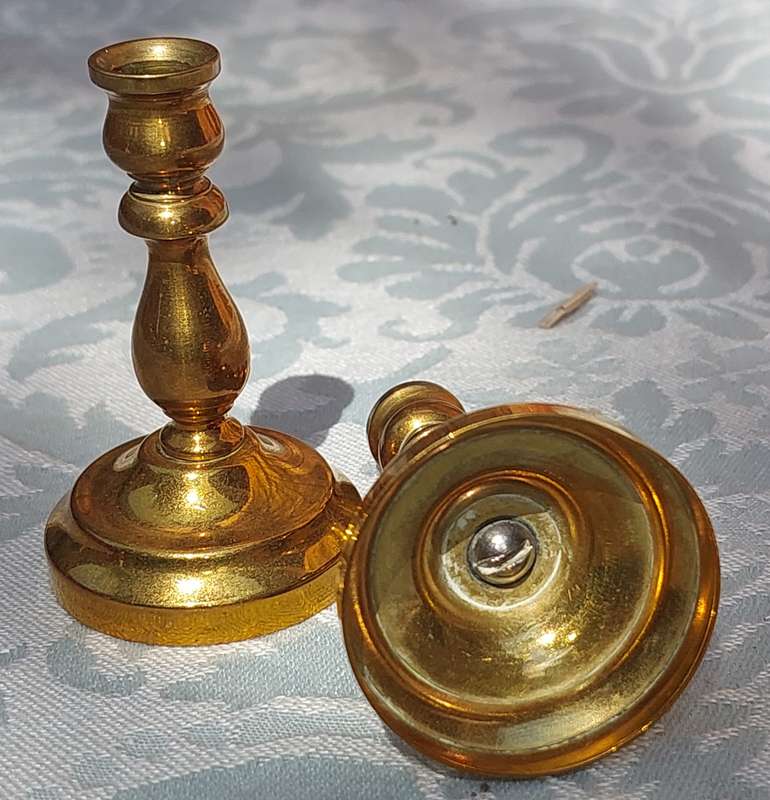 TWO MINIATURE BRASS CANDLE HOLDERS