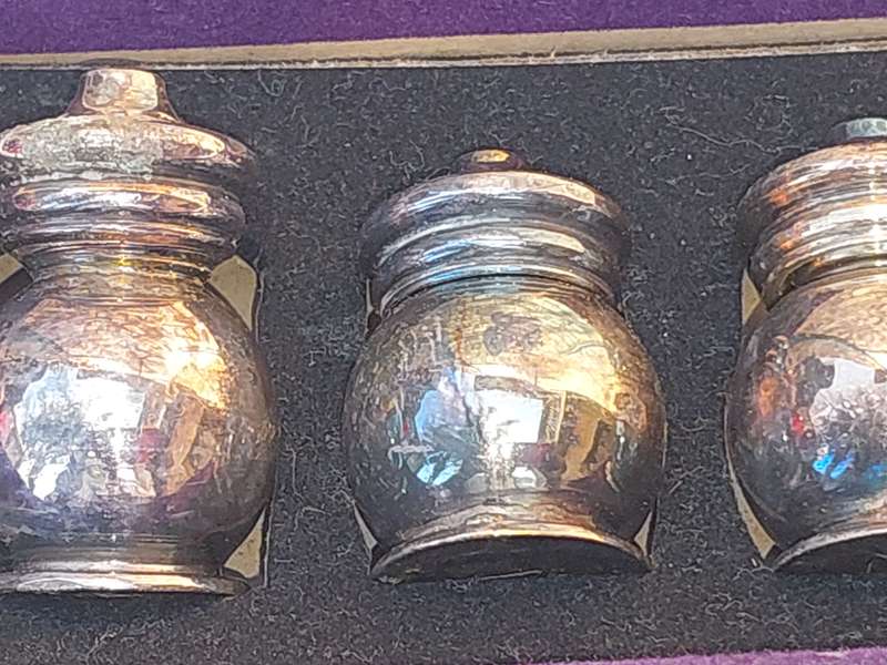 A SET OF 6 ANTIQUE EPNS SALT AND PEPPER DISPENSERS