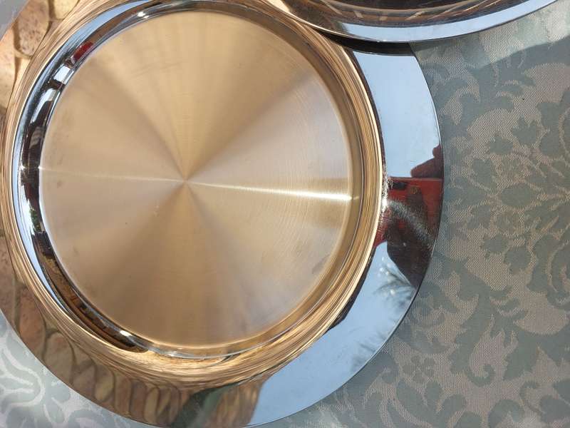 A SINGLE SETTING DINNER STAINLESS STEEL CHROME PLATE AND BASE TRAY