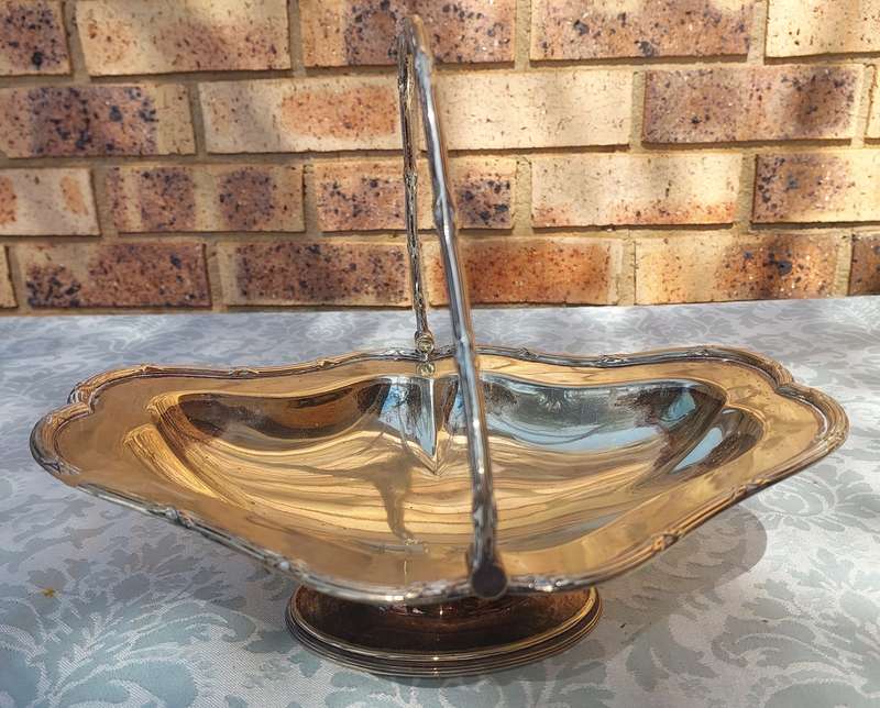A VINTAGE VICTORIAN EPNS WEDDING BASKET SERVING TRAY