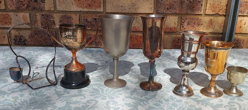 A VINTAGE COLLECTION FLUTES AND A TROPHY