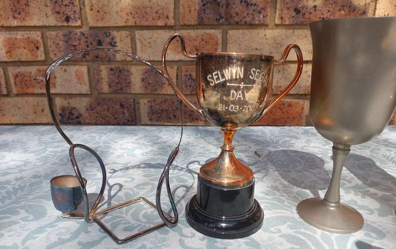 A VINTAGE COLLECTION FLUTES AND A TROPHY