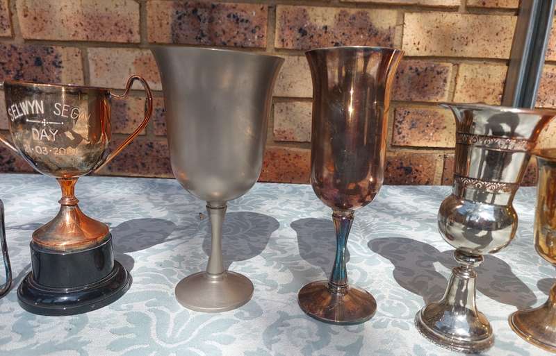 A VINTAGE COLLECTION FLUTES AND A TROPHY