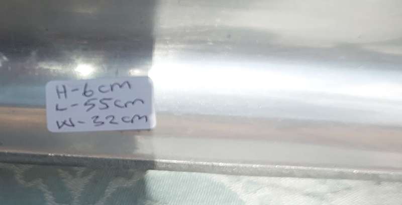 AN ALUMINIUM ALLOY PEWTAL CASSEROLE CADDY