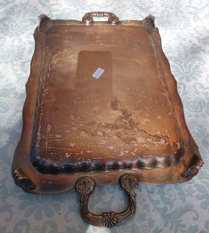 A VINTAGE FOOTED SILVER PLATED SERVING TRAY