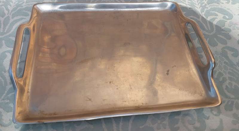 A VINTAGE PEWTAL SERVING TRAY SOLD AS IS
