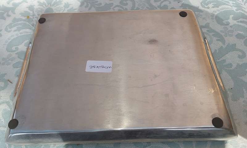 A VINTAGE PEWTAL SERVING TRAY SOLD AS IS
