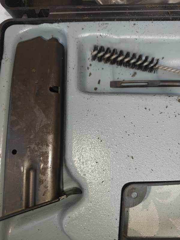A CZ COMPACT STORAGE CASE WITH THE BRUSHES AND A MAGAZINE SOLD AS IS NO GUN