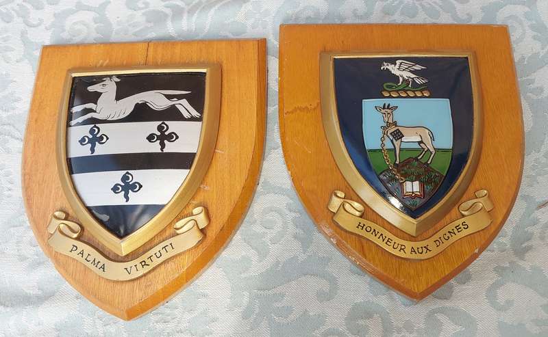 TWO COAT OF ARMS SHIELDS SOLD AS IS