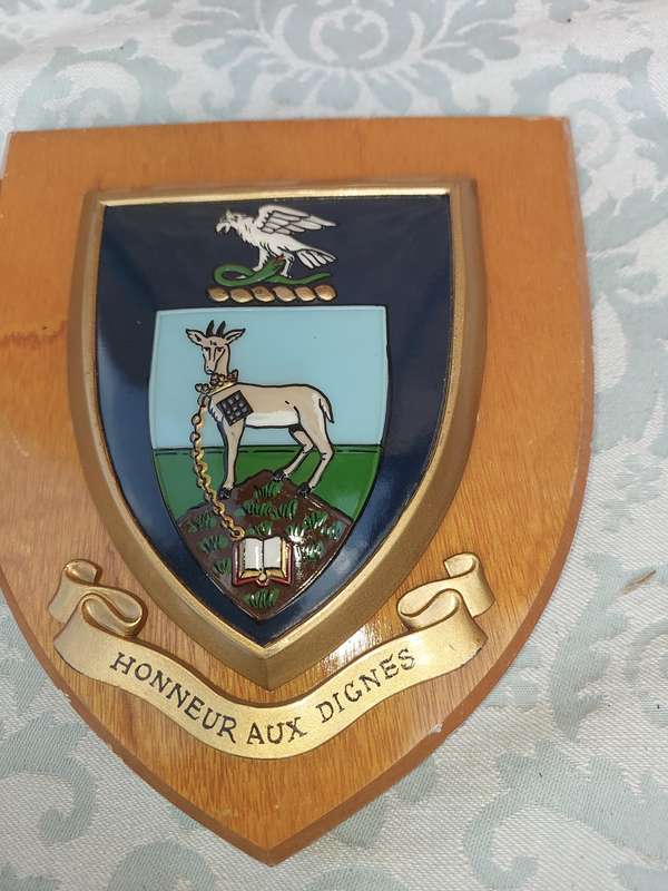 TWO COAT OF ARMS SHIELDS SOLD AS IS