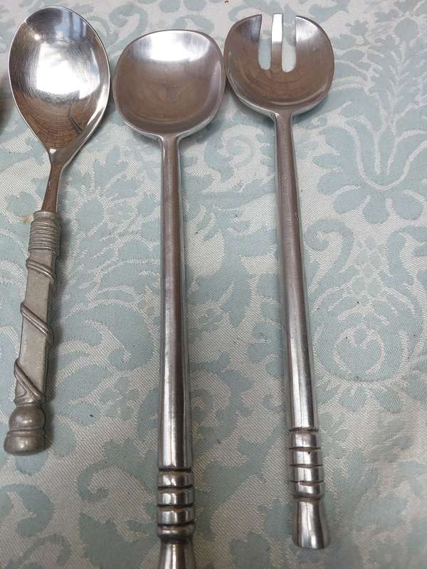 A COLLECTION OF 3 SETS OF CAROL BOYES STYLE PEWTAL SALAD LADELS SOLD AS IS