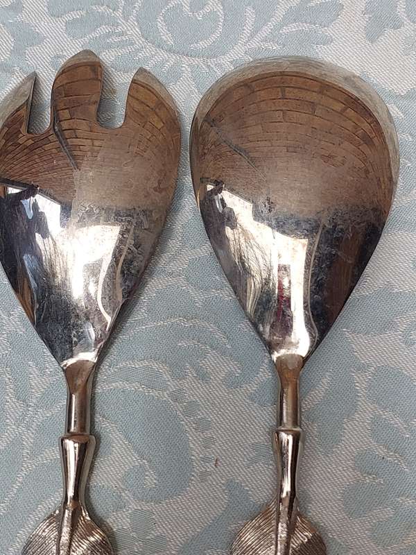AN ART DECOR STAINLESS STEEL SET SALAD LADEL
