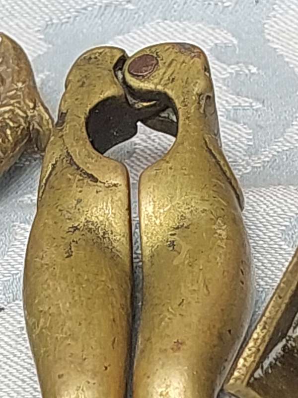 A COLLECTION OF BRASS UTENSILS