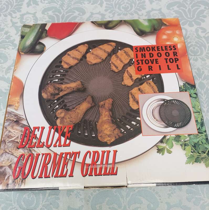 A DELUXE GOURMET CRILL NEVER USED SOLD AS IS