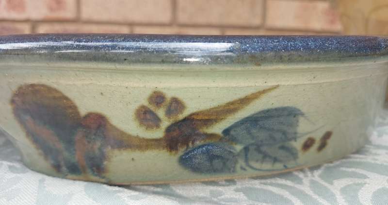 A COLLECTION OF OVEN PROOFE CERAMIC CASSEROLES