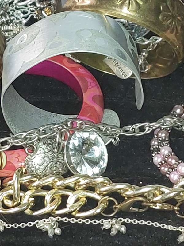 A VINTAGE JOBLOT BRACELETS AND BANGLES SOLD AS IS