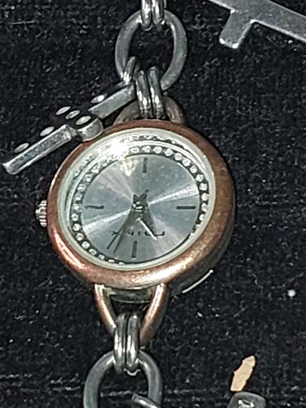 A JOBLOT BRACELET WATCHES AND CHARMS SILVER PLATE SOLD AS IS