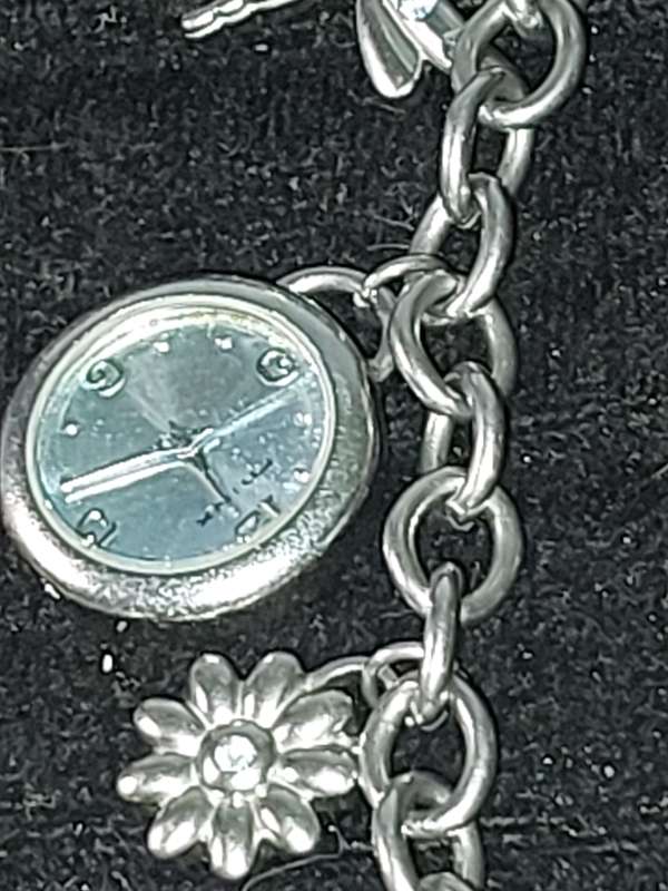 A JOBLOT BRACELET WATCHES AND CHARMS SILVER PLATE SOLD AS IS