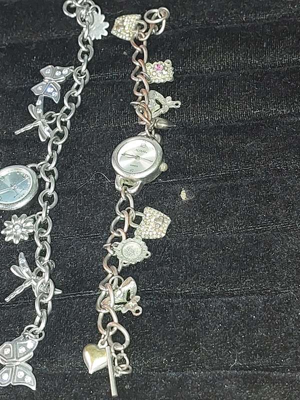 A JOBLOT BRACELET WATCHES AND CHARMS SILVER PLATE SOLD AS IS