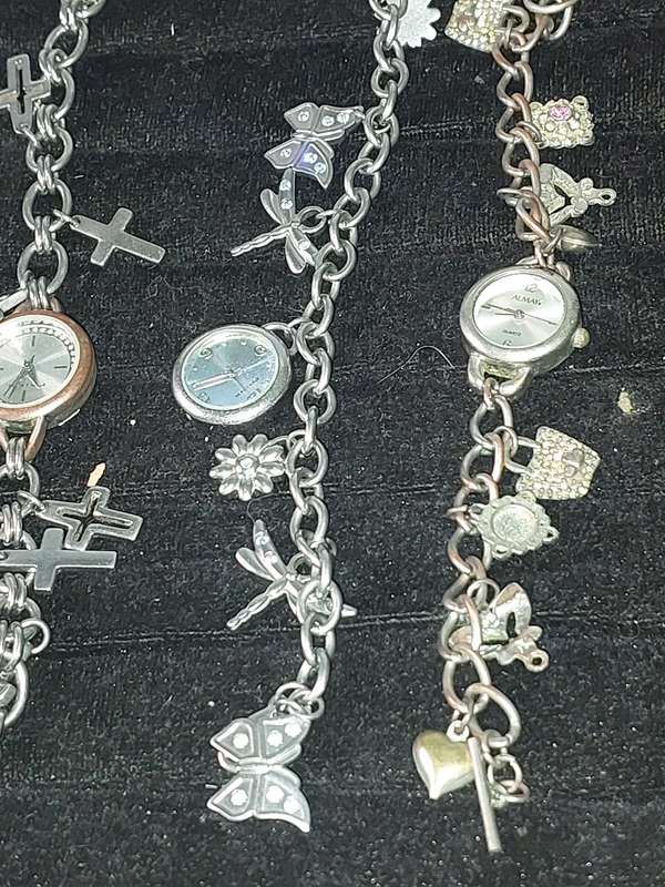 A JOBLOT BRACELET WATCHES AND CHARMS SILVER PLATE SOLD AS IS