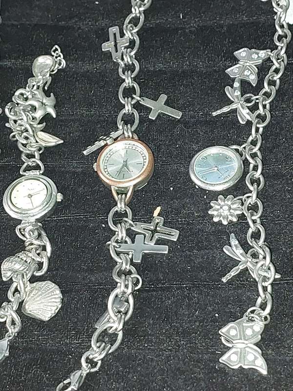 A JOBLOT BRACELET WATCHES AND CHARMS SILVER PLATE SOLD AS IS