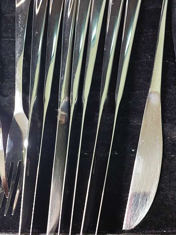 AN 18 PIECE @HOME STAINLESS STEEL CUTLERY SET SOLD AS IS