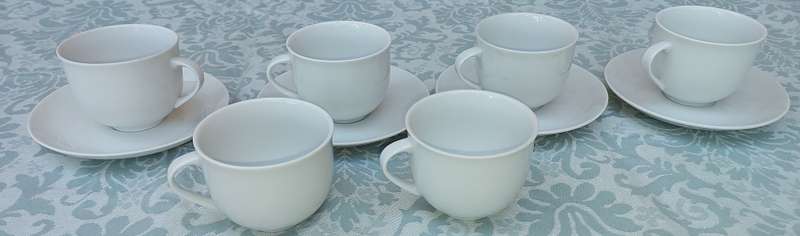 A vintage collection of 6 cups and 4 saucers white porcelain Royal Avon