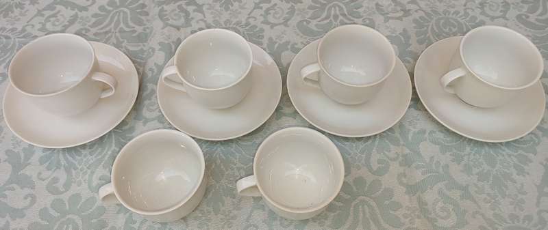 A vintage collection of 6 cups and 4 saucers white porcelain Royal Avon