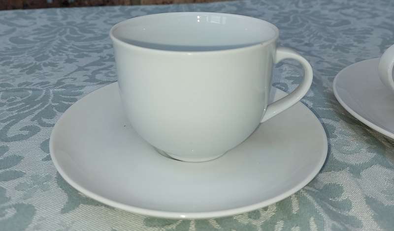 A vintage collection of 6 cups and 4 saucers white porcelain Royal Avon