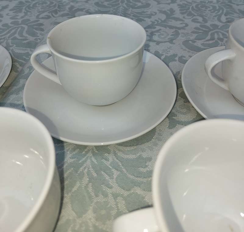 A vintage collection of 6 cups and 4 saucers white porcelain Royal Avon