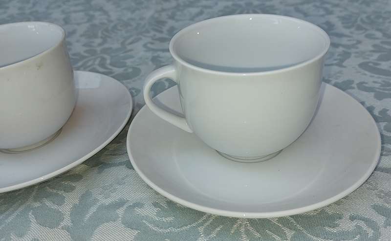 A vintage collection of 6 cups and 4 saucers white porcelain Royal Avon