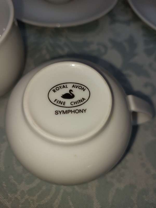 A vintage collection of 6 cups and 4 saucers white porcelain Royal Avon