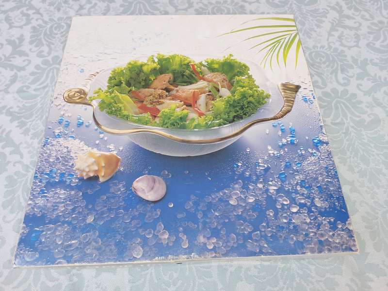 A CONTEMPORARY GLASS COLLECTION PORCELAIN SHELL WITH GOLD TRIM