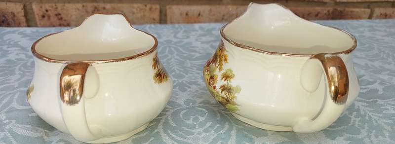 TWO VINTAGE ALFRED MEAKEN ENGLAND JUGS WITH GOLD TRIM SOLD AS IS